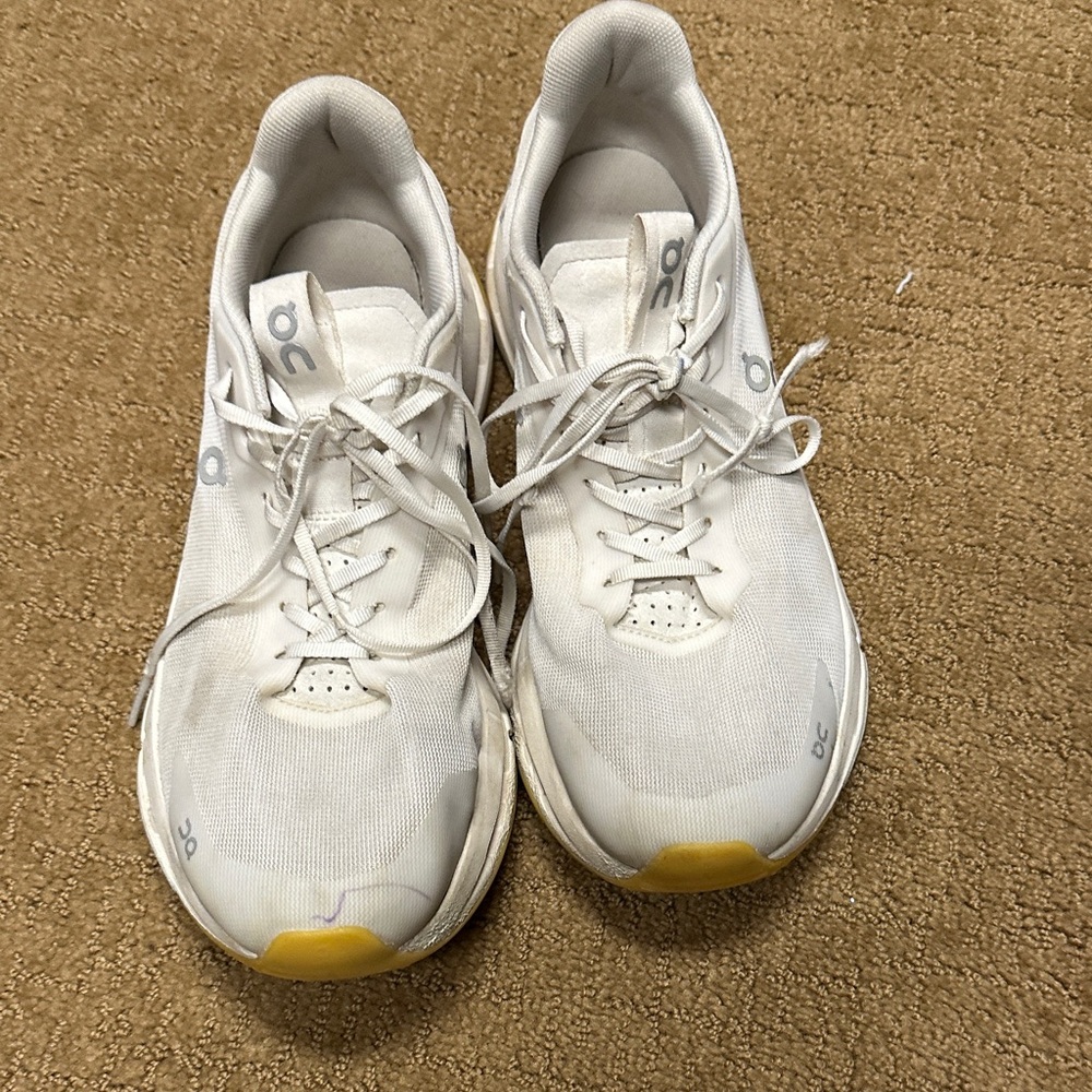 On Running White Athletic Shoes still plenty of life. Shoe strings need replaced